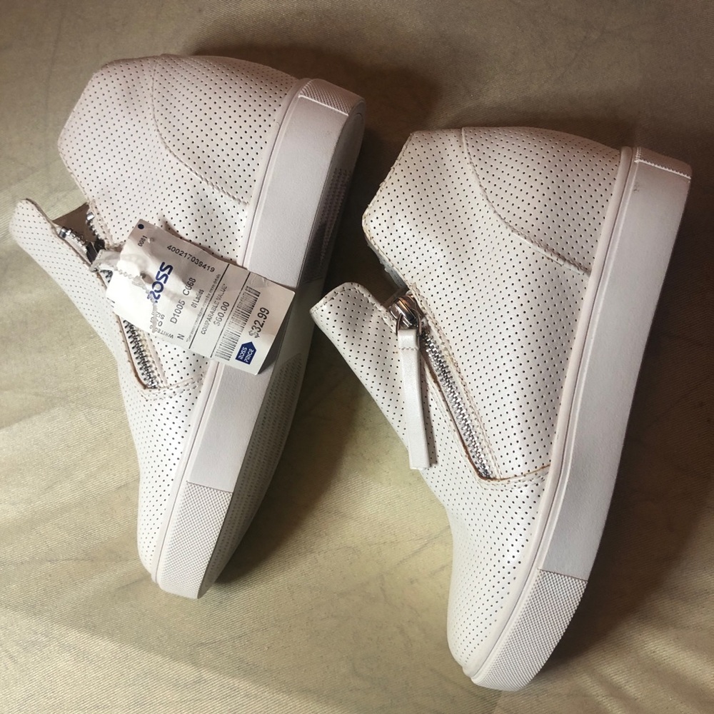Steve Madden Perforated White Zipper Booties. Callout
